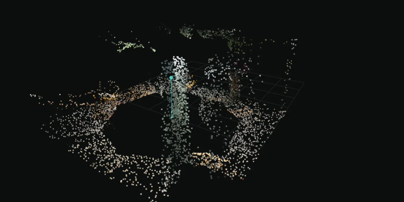 Skopos point cloud view: a room rebuilt as coloured dots, with a grid floor